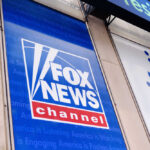 Fox News channel sign on building exterior.