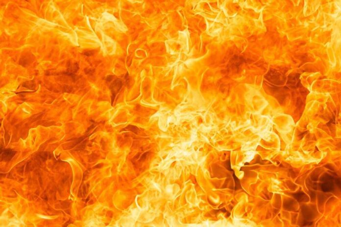 shutterstock_2477449591.jpg featured image Bright orange and yellow flames burning intensely.