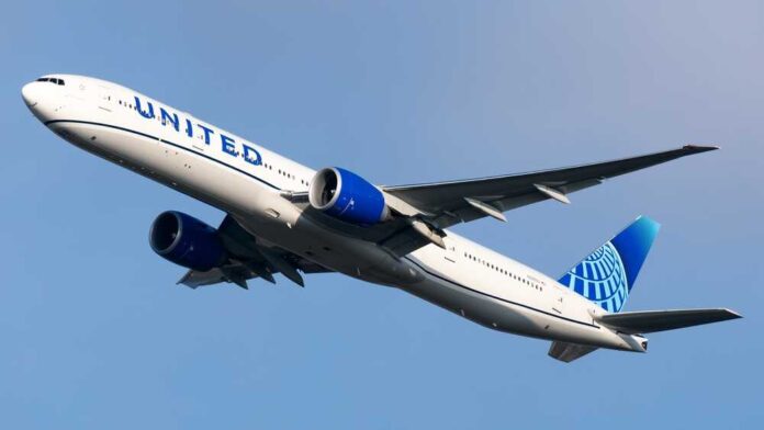 shutterstock_2446491107.jpg featured image Airplane flying in clear blue sky daytime