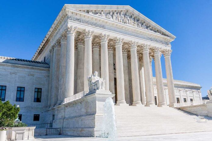 1118403221 featured image Supreme Court building with columns, fountain, and statue.