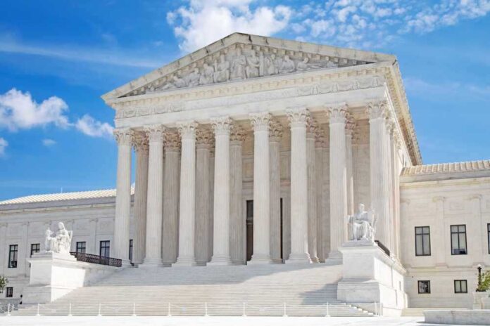 shutterstock_2312619675.jpg featured image United States Supreme Court building with statues and columns.