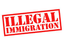 Red illegal immigration stamp on white background