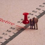 Miniature elderly figures by retire pin marker