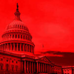 United States Capitol building under red tinted sky