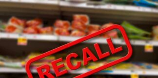 Recall notice over grocery store shelves.