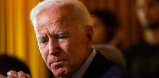 Joe Biden solemn, thinking.