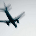 Airplane in flight with motion blur