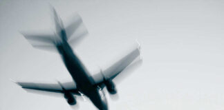 Airplane in flight with motion blur
