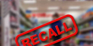 Recall stamp on blurred store aisle background
