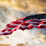 Six Soldiers CHARGE Active Shooter — Incredible Outcome American flag waving against a cloudy sky