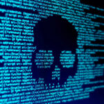 Skull silhouette in blue computer code background