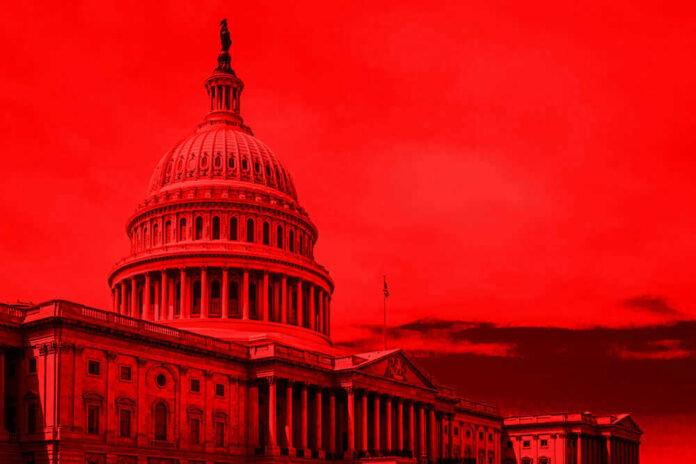 United States Capitol building under red-tinted sky