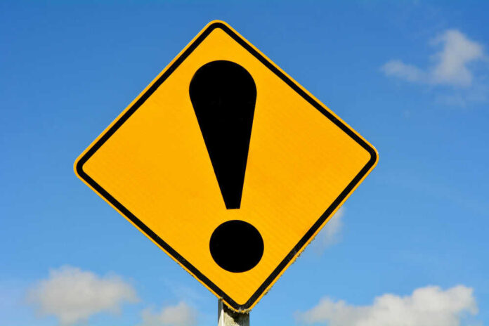 Yellow caution sign with exclamation mark symbol