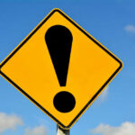 GOP Candidate’s Family WIPED OUT — Helicopter DISASTER Yellow caution sign with exclamation mark symbol.