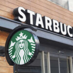 Union Uprising Threatens Starbucks Empire Starbucks cafe exterior with logo and sign