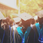 SHOCKING University Decision Stuns Education World Graduates wearing caps and gowns in ceremonial procession