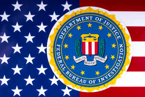 FBI seal overlaid on an American flag background