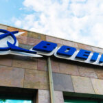 Boeing logo on building with cloudy sky background