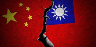 A cracked representation of the Chinese and Taiwanese flags symbolizing conflict