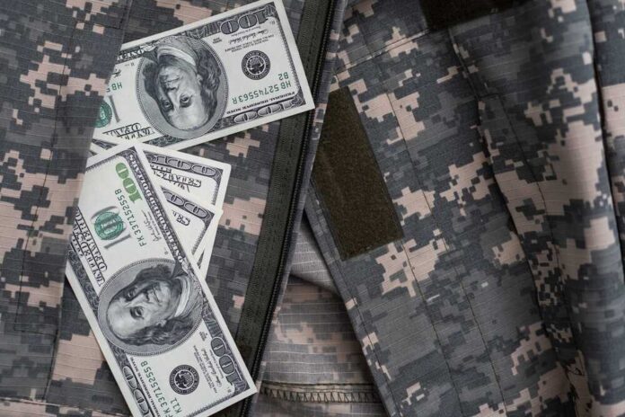 Cash placed inside a military uniform pocket