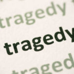 VIDEO: Rail Horror — Crane Crash Kills Dozens Close-up of the word 'tragedy' printed multiple times in varying shades