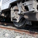 39 Dead in Horrific Train Crash Close-up view of a train wheel on railway tracks