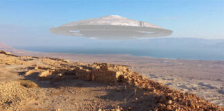 A UFO hovering over a desert landscape with ancient ruins