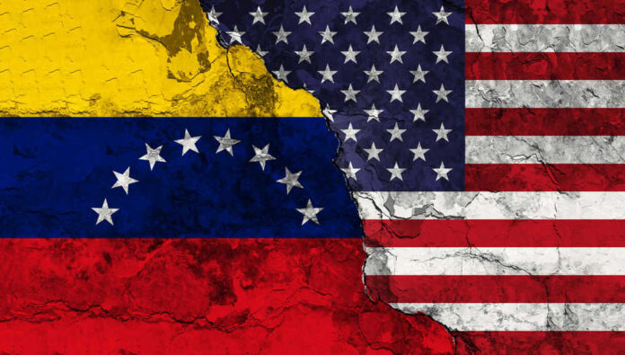 Cracked Venezuela and USA flags side by side