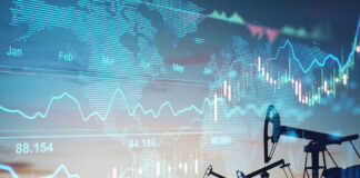 Oil pumps and financial charts against world map