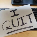 Leftist Governor Quits Over Massive Fraud A resignation letter reading 'I QUIT' placed on a keyboard