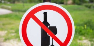 Sign indicating prohibition of alcohol with a bottle and glass symbol