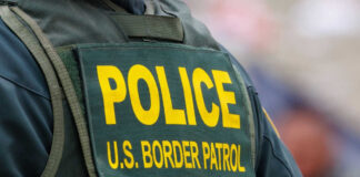 Back of US Border Patrol officers vest