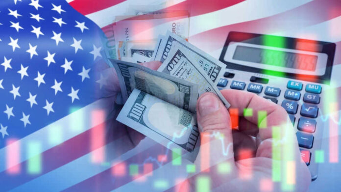 USA flag calculator and hands holding dollars overlapping