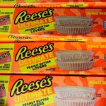 Three king-size Reese's Ultimate Peanut Butter Lovers candy bars displayed