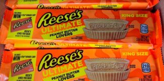 Three king-size Reese's Ultimate Peanut Butter Lovers candy bars displayed