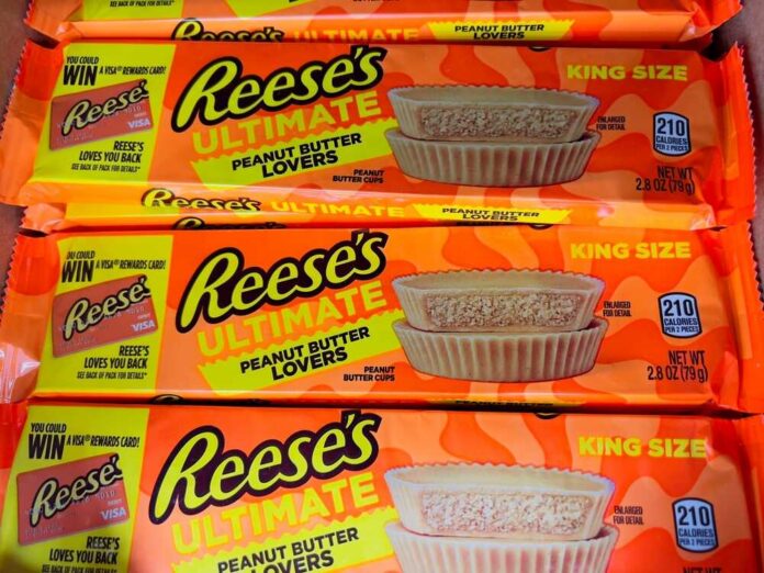 Three king-size Reese's Ultimate Peanut Butter Lovers candy bars displayed