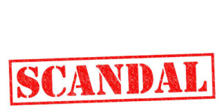 Red stamp with the word scandal