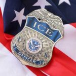 Perjury Bombshell Rocks ICE Shooting Case ICE officer badge resting on an American flag
