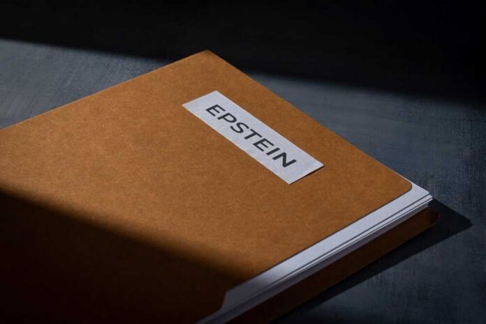 shutterstock_2737964063.jpg A brown folder with a label reading 'EPSTEIN'