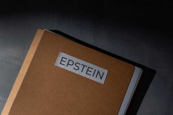 shutterstock_2741629687.jpg A brown folder with the label 'EPSTEIN' on it
