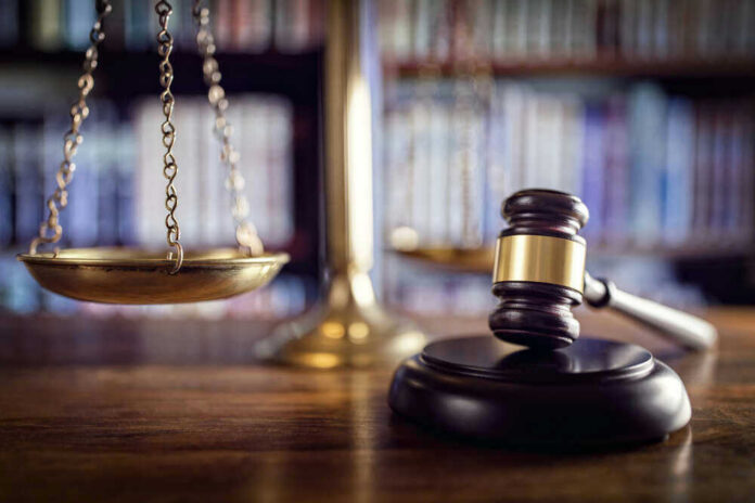Scales and gavel on a judges desk.
