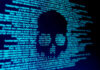 Encrypted Signals Spark Terrorist Sleeper Cell Concerns Skull silhouette in blue computer code background.