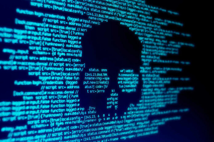 shutterstock_1050436496.jpg Skull silhouette in blue computer code background.