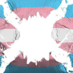 Transgender flag overlaid on a world map.