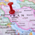 Iran Target List Sends Oil Soaring Red pushpin on map of Iran