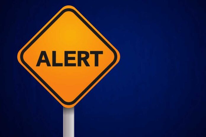 shutterstock_2381727603.jpg Orange alert sign with the word 'ALERT' displayed prominently