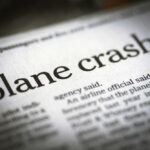 Newspaper headline about a plane crash.