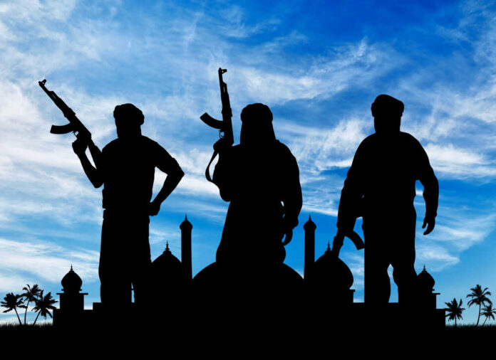 Silhouetted figures holding weapons against a blue sky