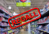 Blurred store aisle with RECALL stamp overlay.