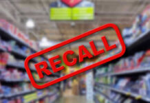 Blurred store aisle with RECALL stamp overlay.